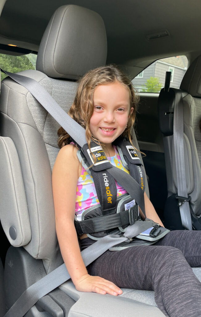 Travel Car Seat Expert - A young girl sitting in a car seat.