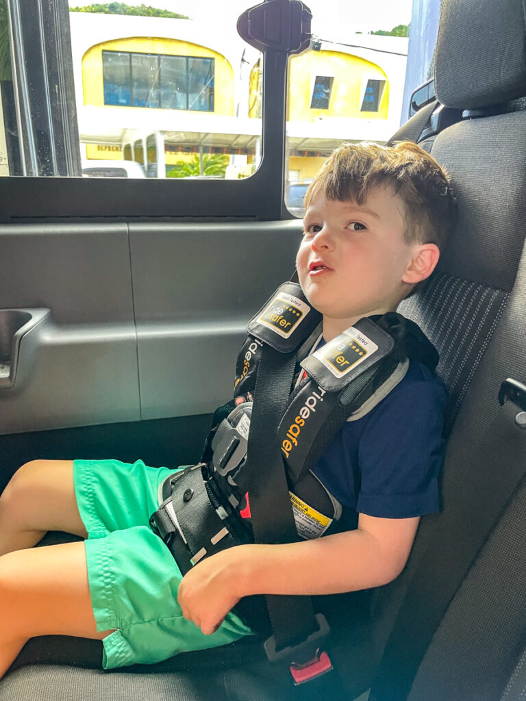 Travel Car Seat Expert - 5 year old boy using the Ride Safer Travel Vest as a car seat from cruise travel